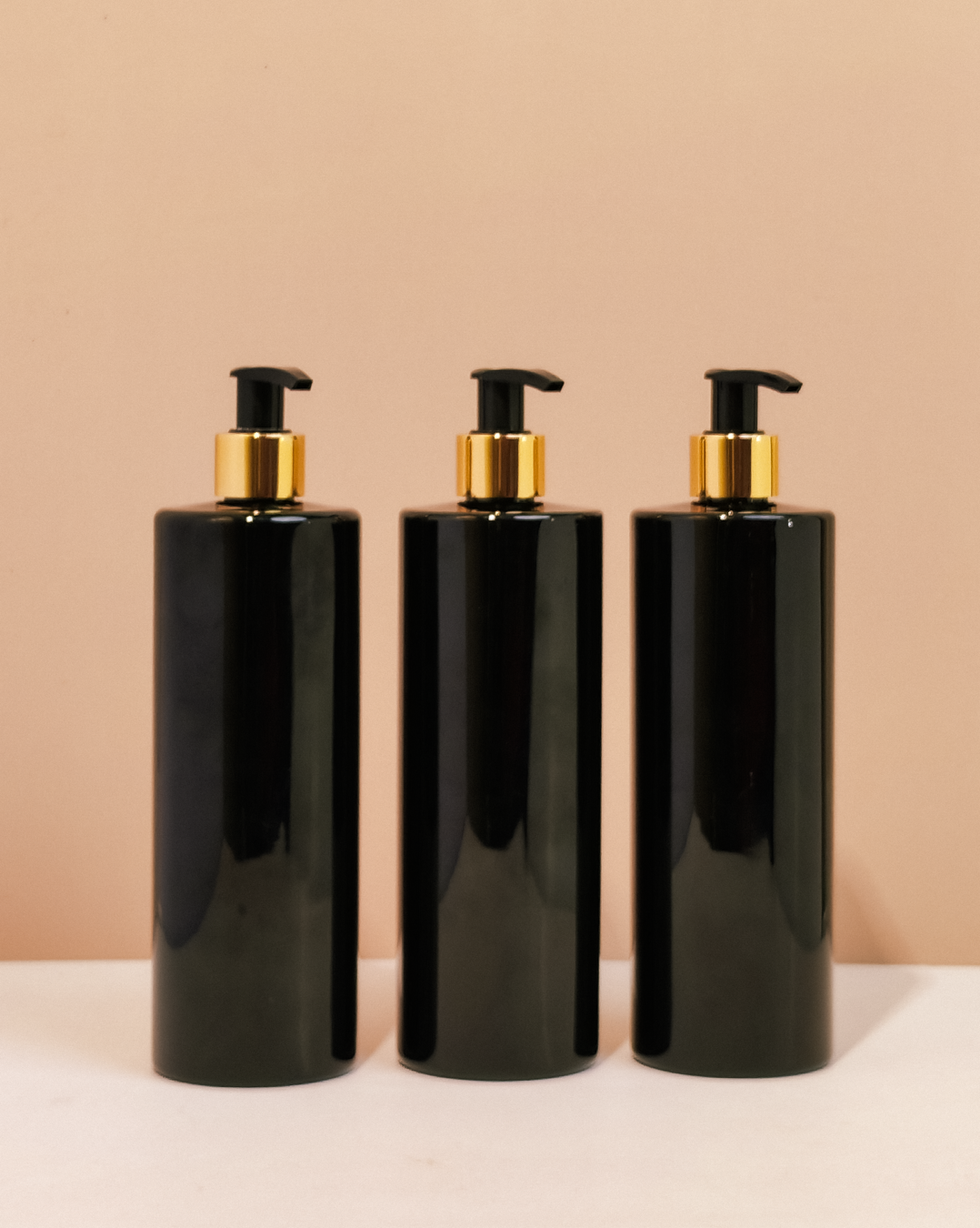 500Ml Tall Pet Bottle With Old Gold Black Lotion Pump