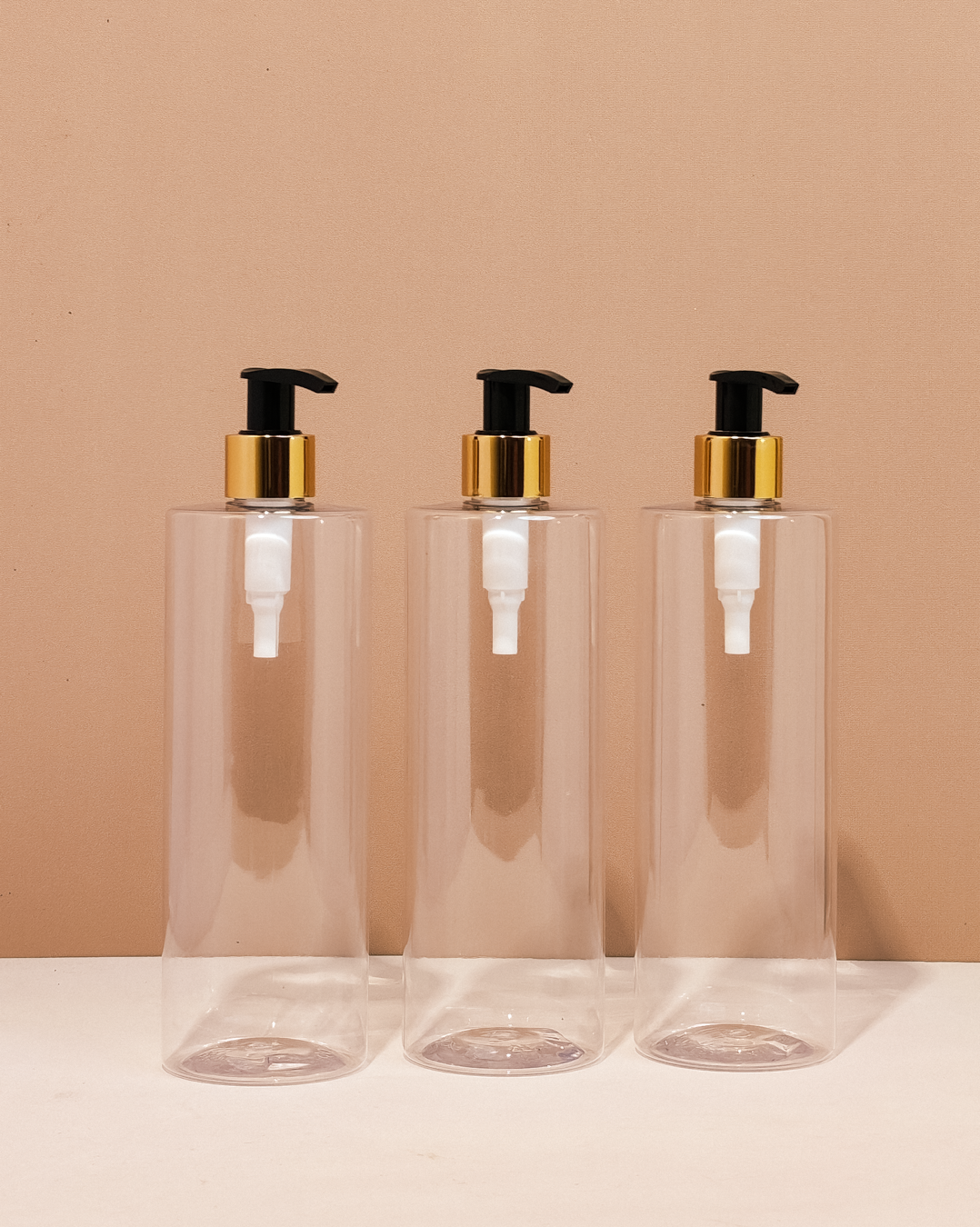 500Ml Tall Pet Bottle With Old Gold Black Lotion Pump