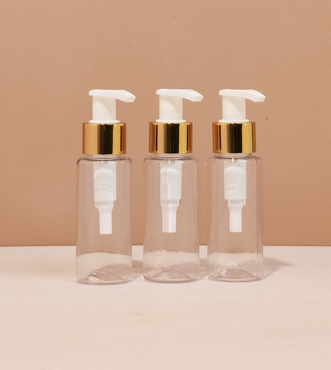 60Ml Pet Bottle With Old Gold White Lotion Pump