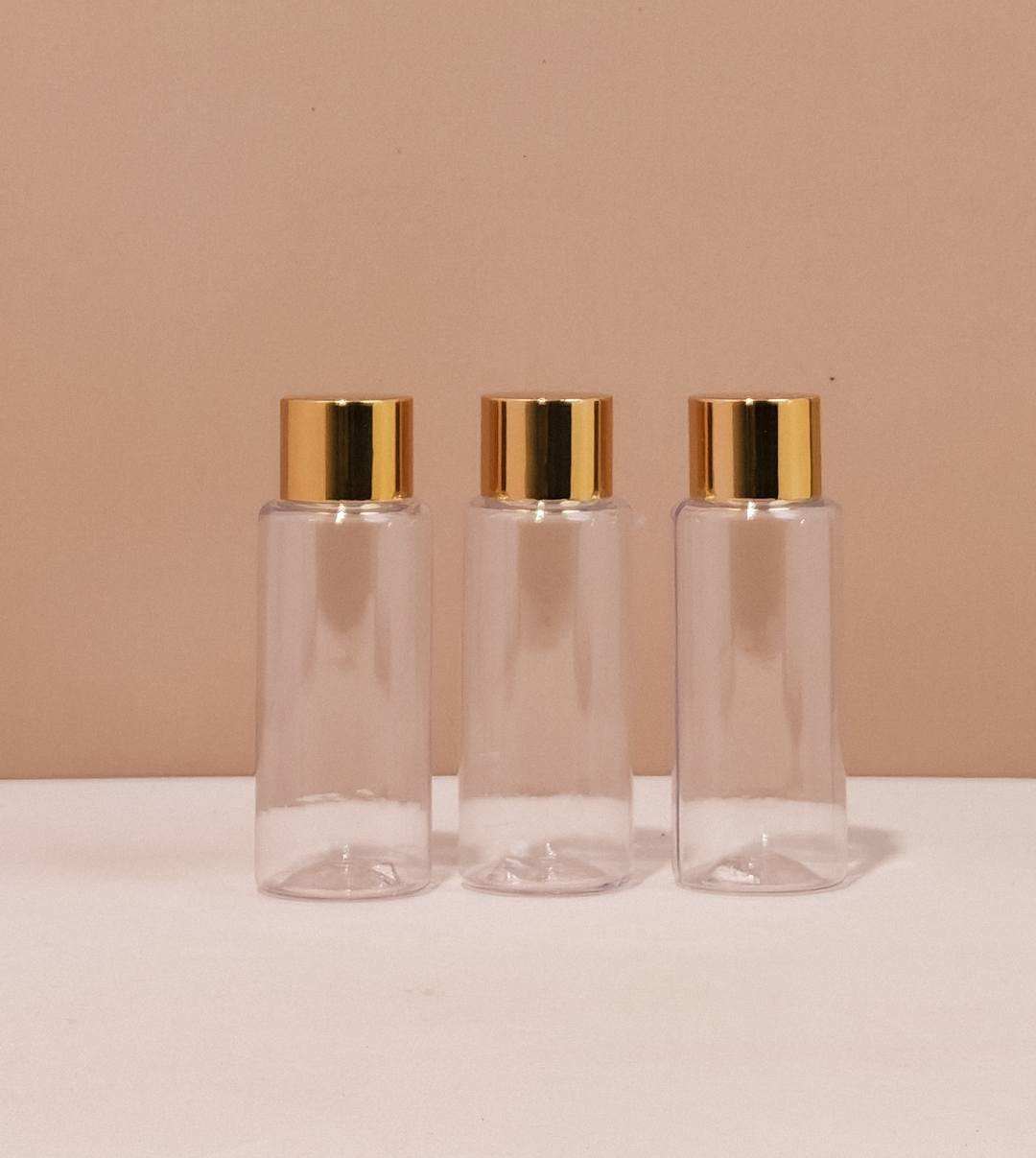 60Ml Pet Bottle With Gold Shiny Screw Cap