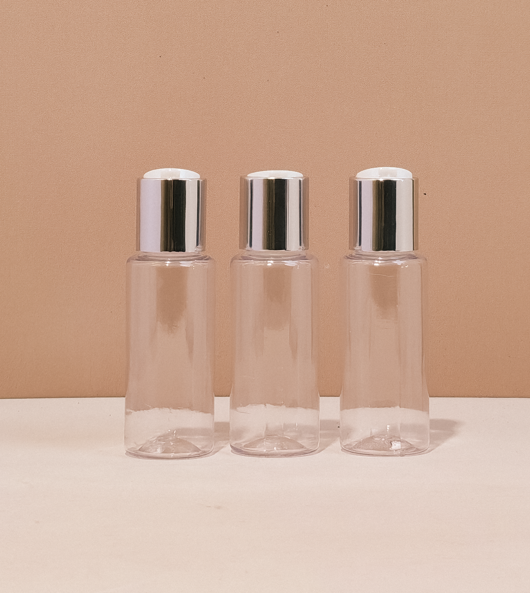 60Ml Pet Bottle With Silver Press Cap