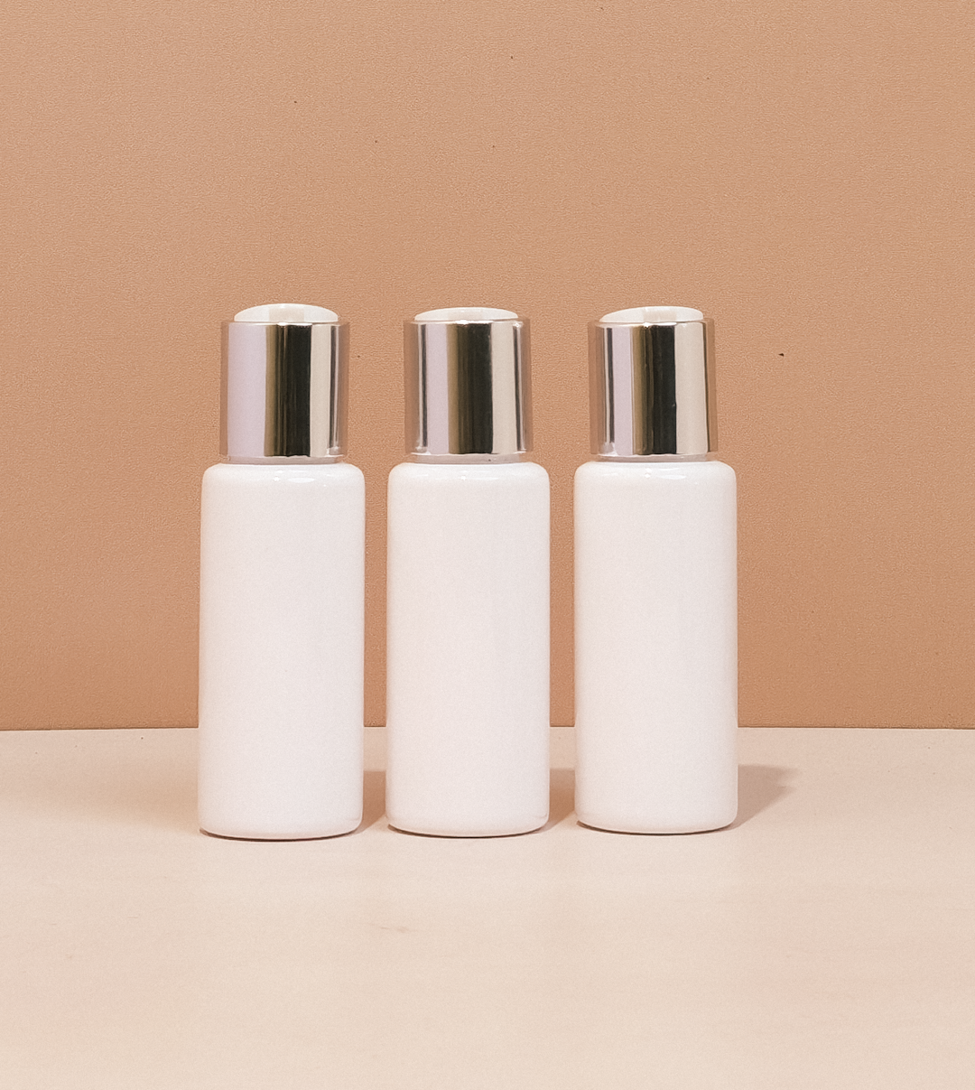 60Ml Pet Bottle With Silver Press Cap