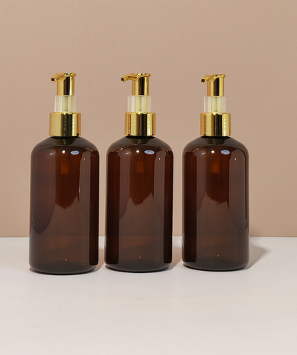 250Ml Short Pet Bottle With All Gold Lotion Pump