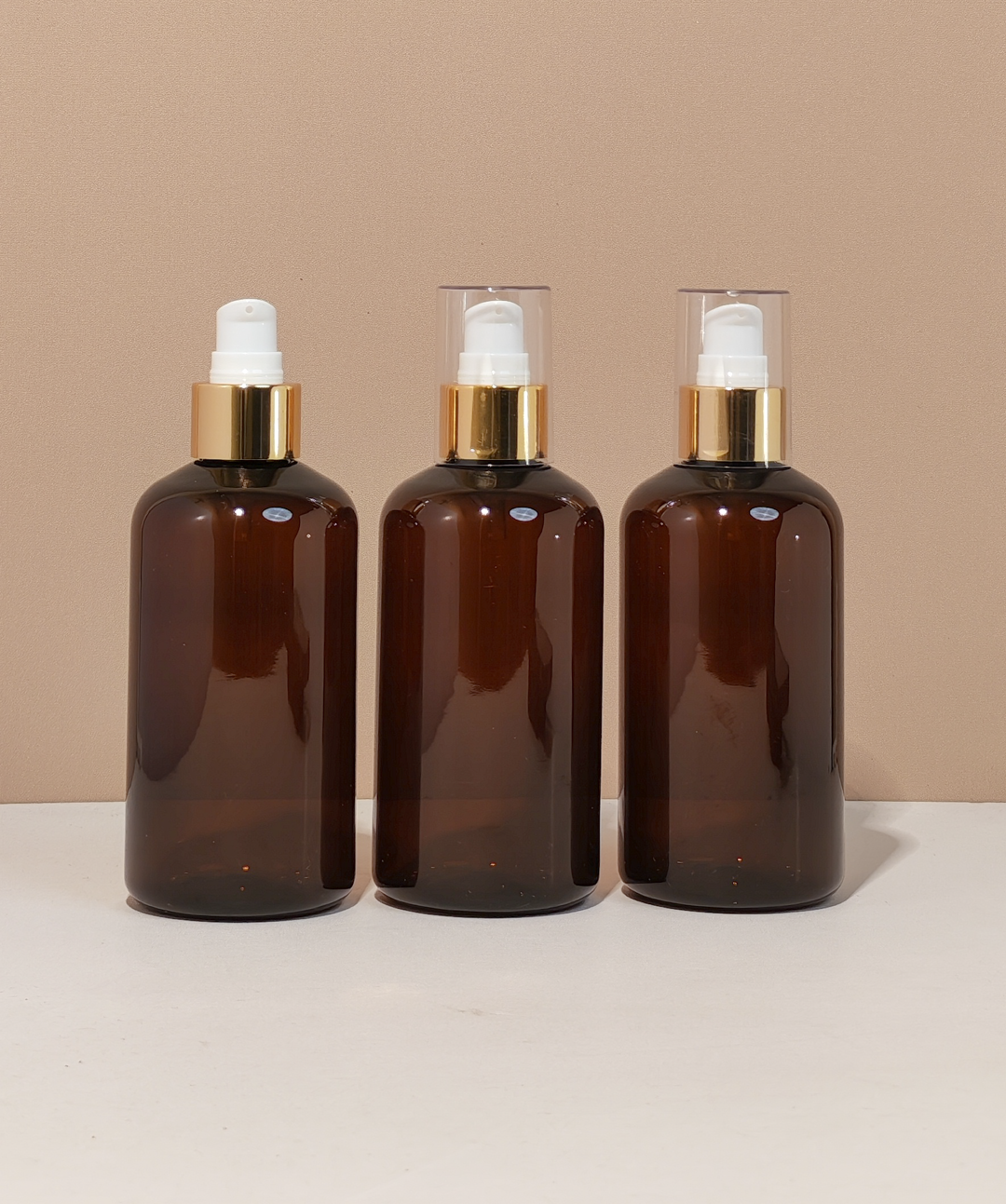 250Ml Short Pet Bottle With Gold Treatment Pump