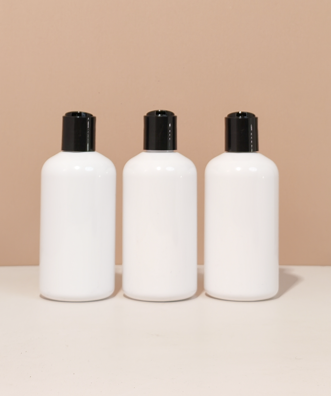 250Ml Short Pet Bottle With Black Press Cap