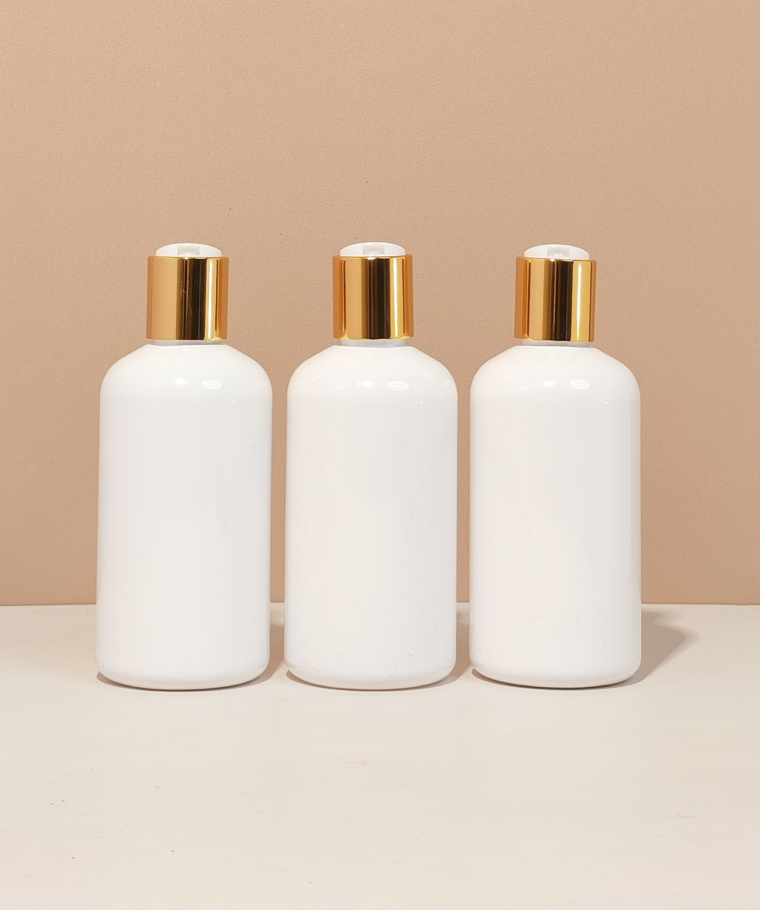 250Ml Short Pet Bottle With Gold Press Cap