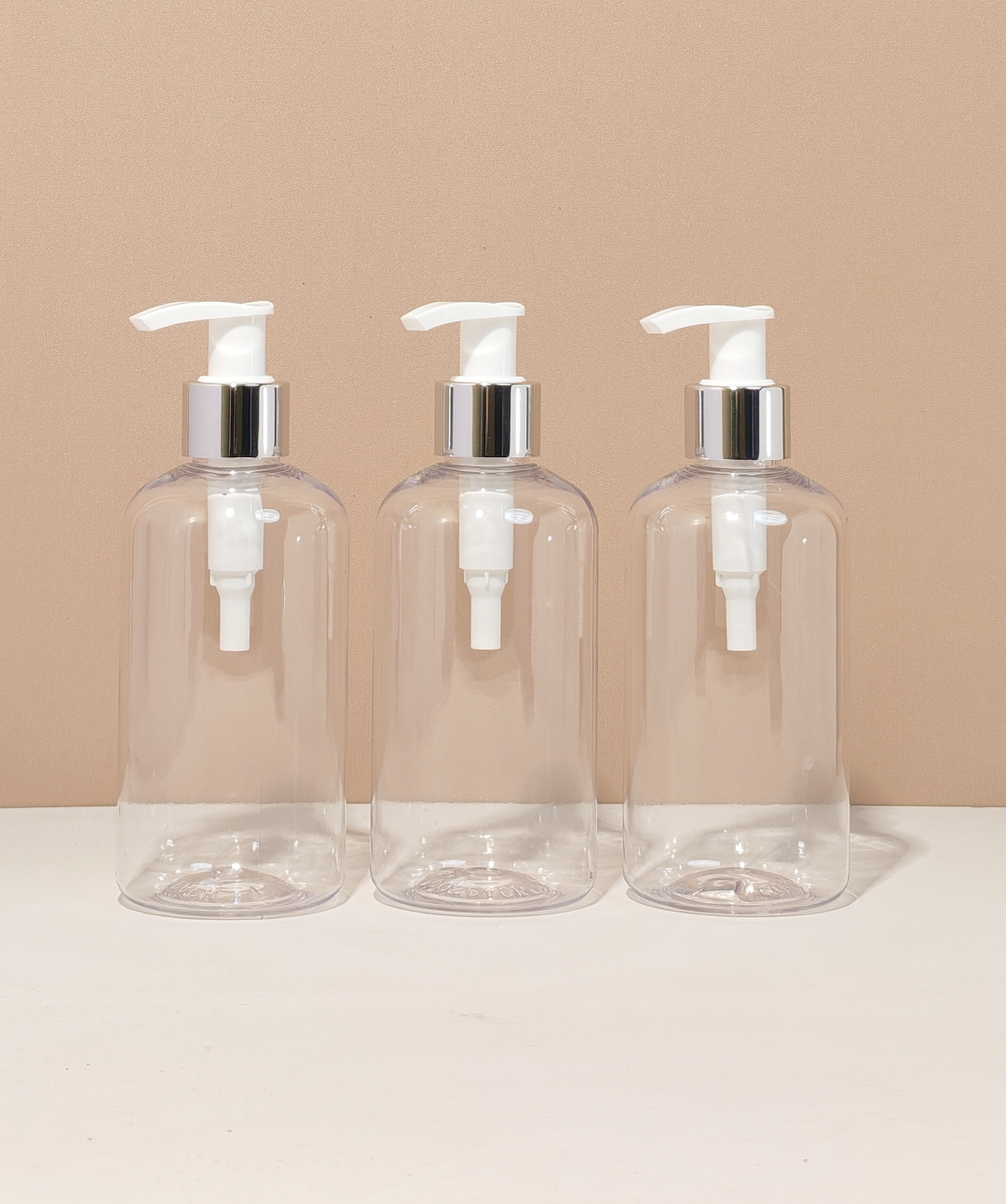 250Ml Short Pet Bottle With Silver White Lotion Pump