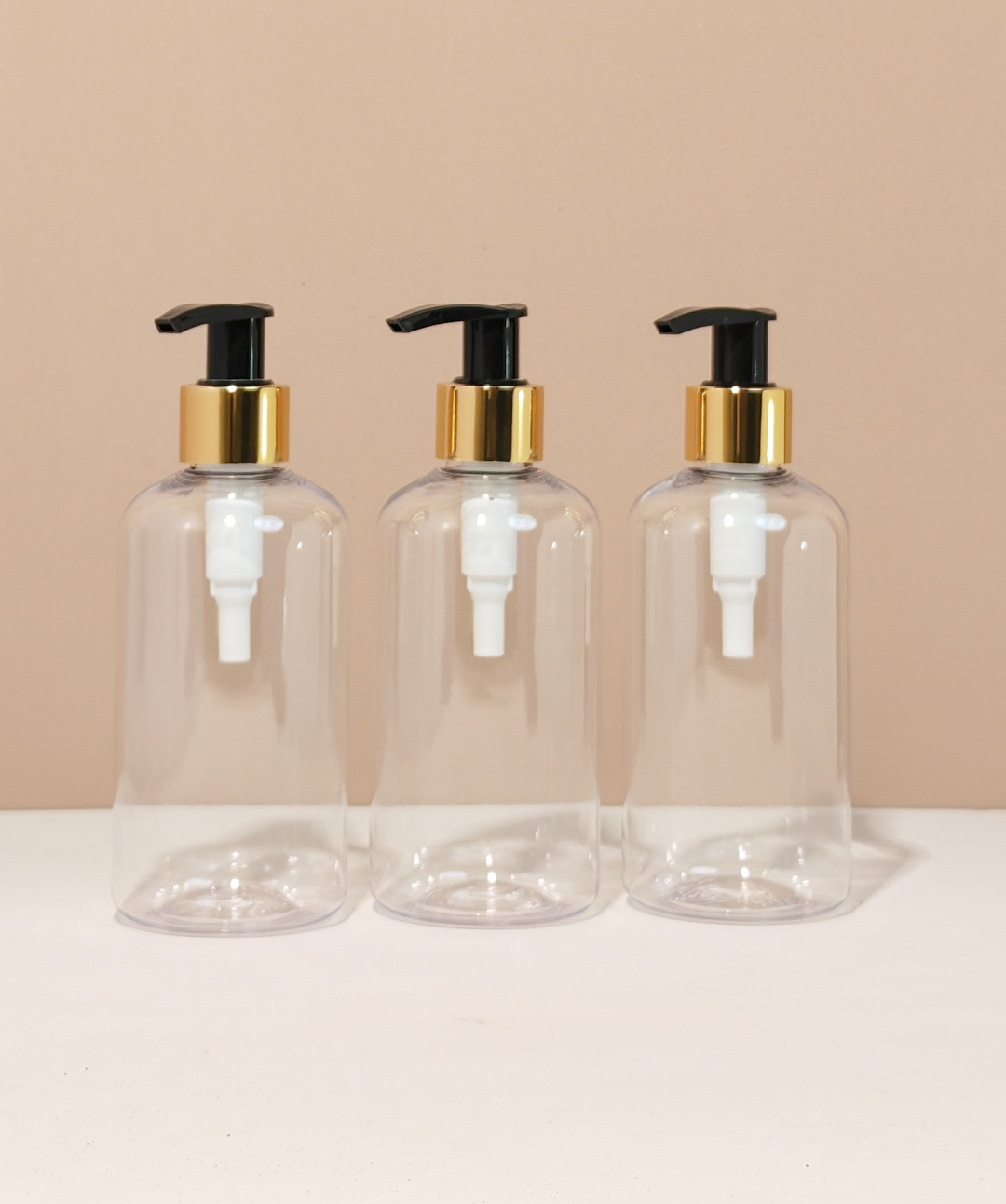 250Ml Short Pet Bottle With Old Gold Black Lotion Pump
