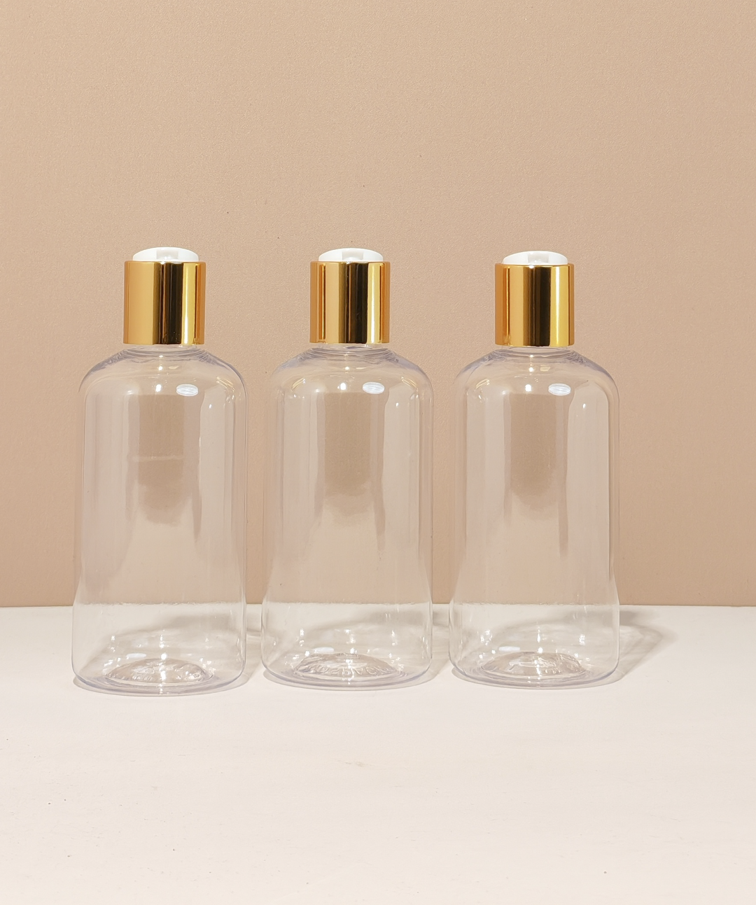 250Ml Short Pet Bottle With Gold Press Cap