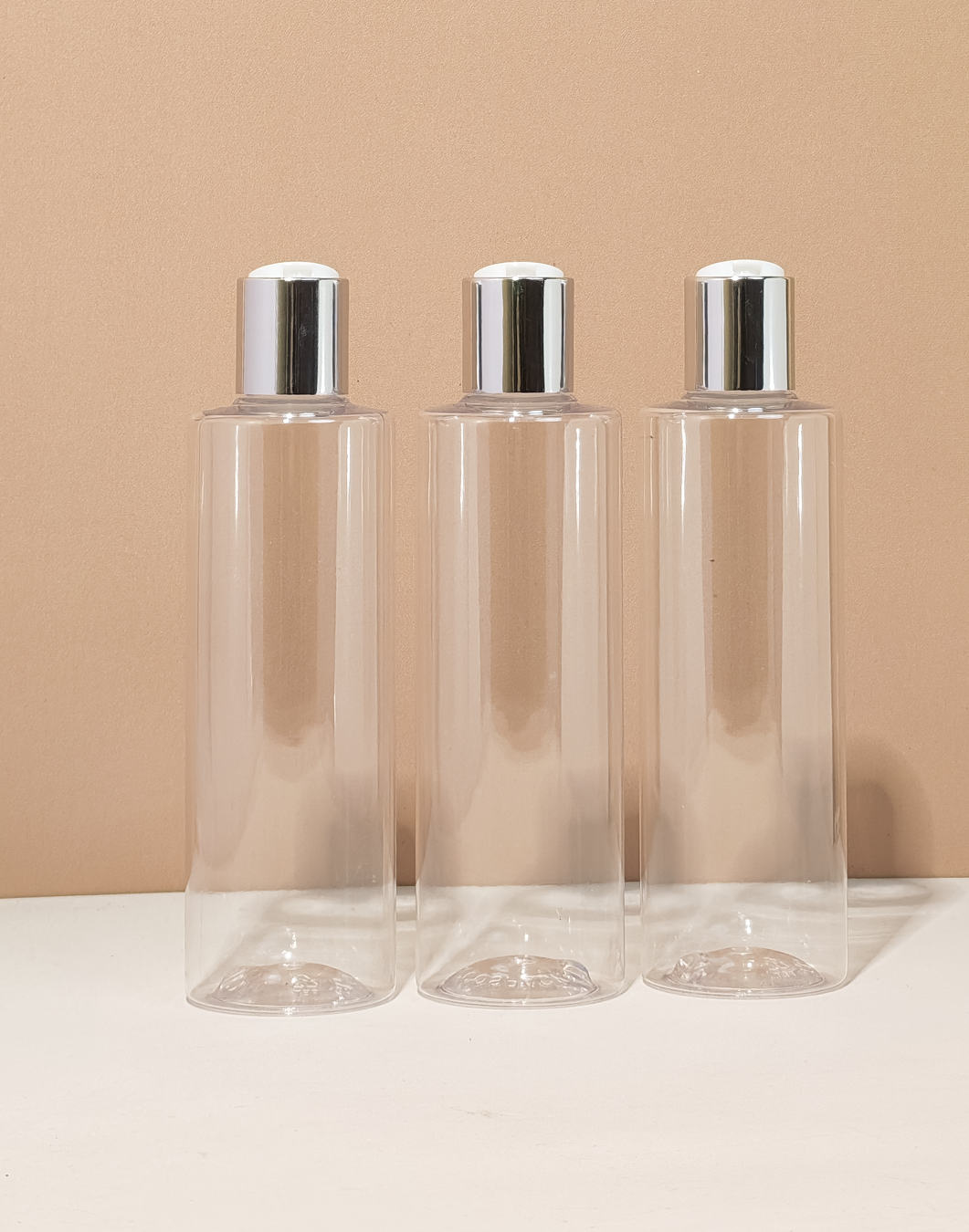 250Ml Tall Pet Bottle With Silver Press Cap