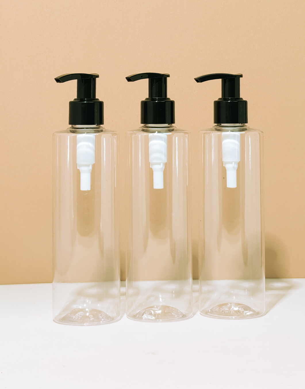 250Ml Tall Pet Bottle With Old Black Lotion Pump