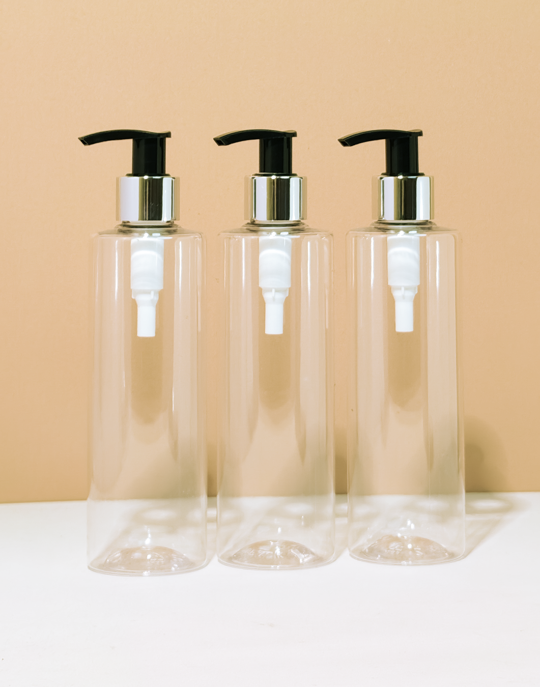 250Ml Tall Pet Bottle With Silver Black Lotion Pump