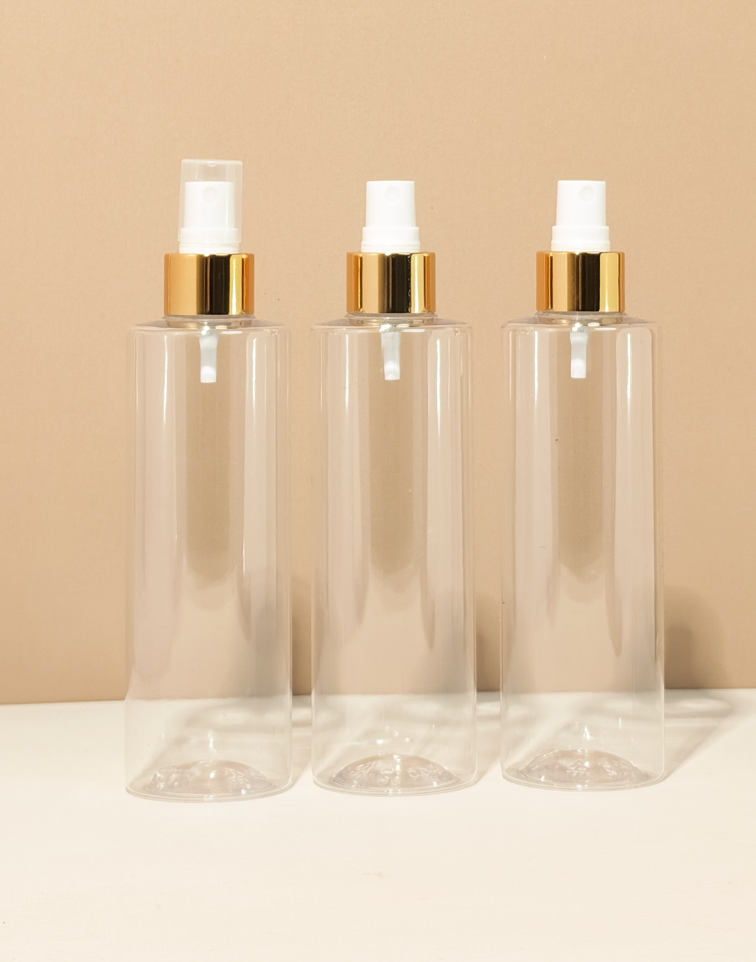 250Ml Tall Pet Bottle With Gold Mist Spray