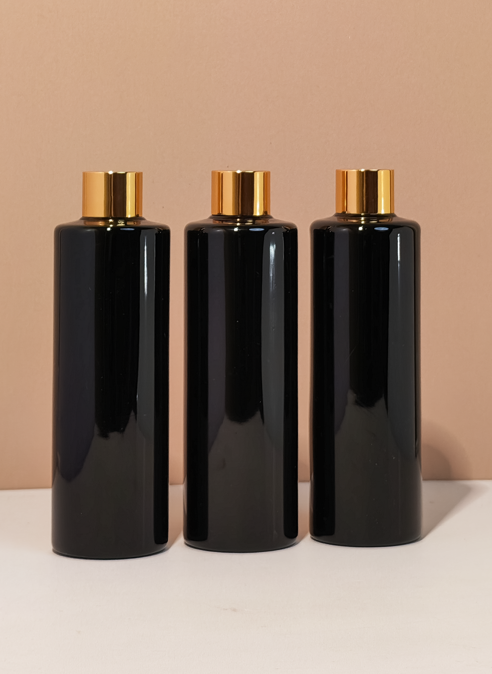 250Ml Tall Pet Bottle With Gold Shinny Screw Caps