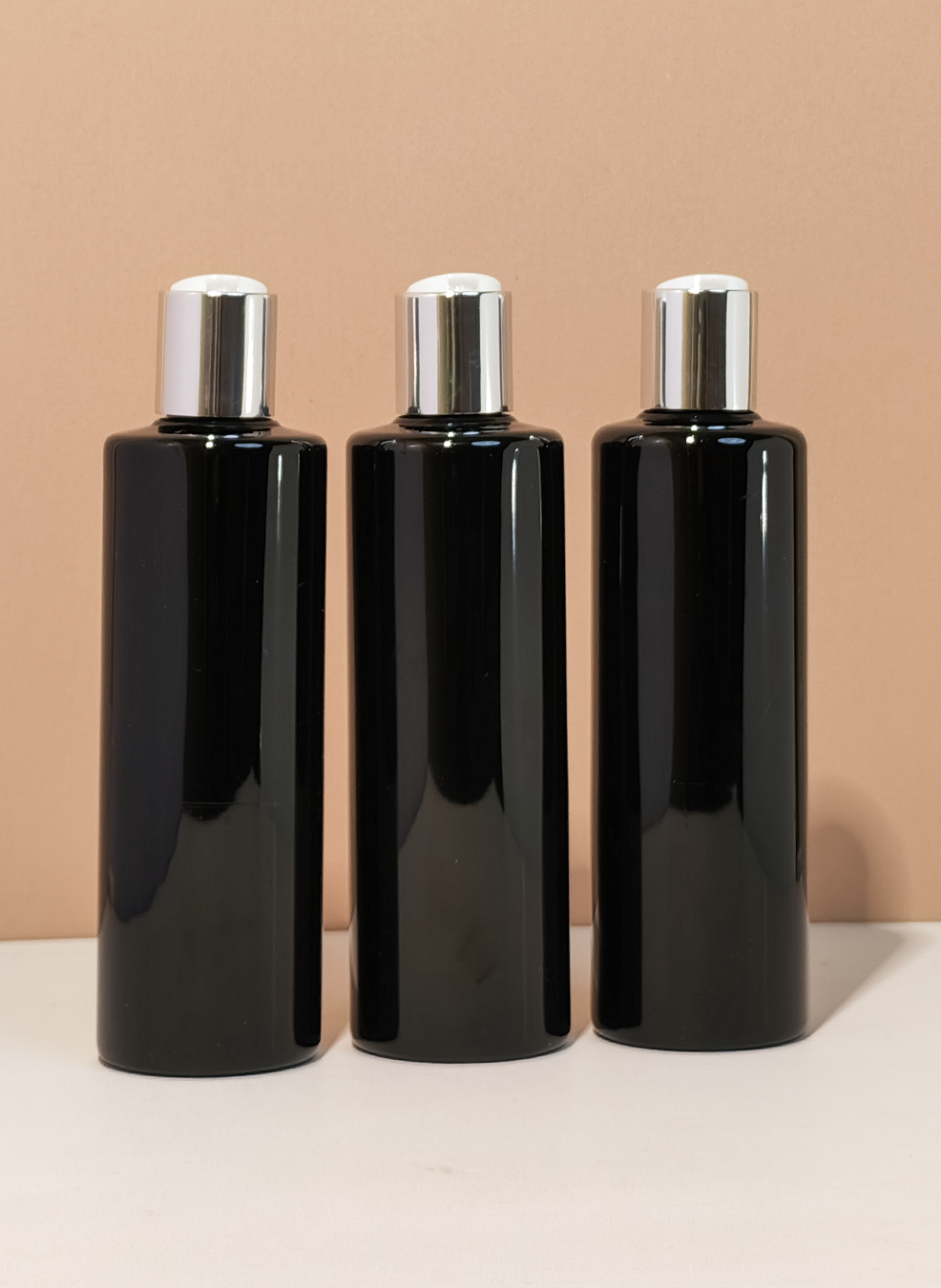250Ml Tall Pet Bottle With Silver Press Cap