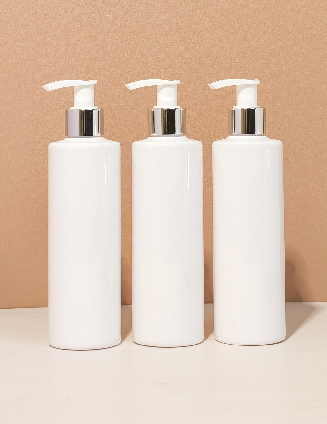 250Ml Tall Pet Bottle With Silver White Lotion Pump