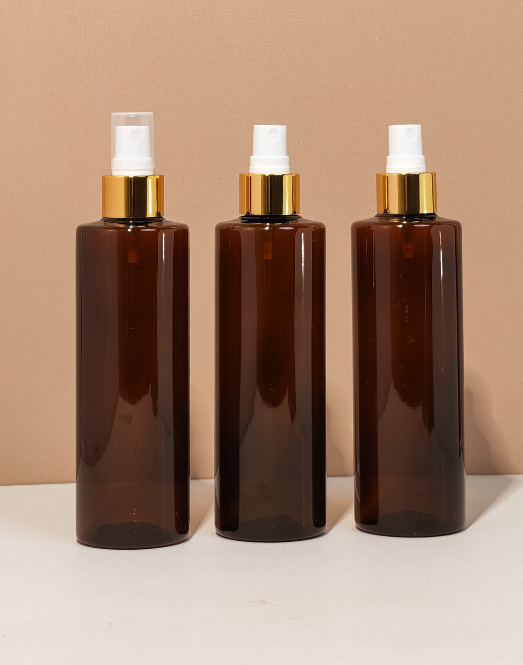 250Ml Tall Pet Bottle With Gold Mist Spray