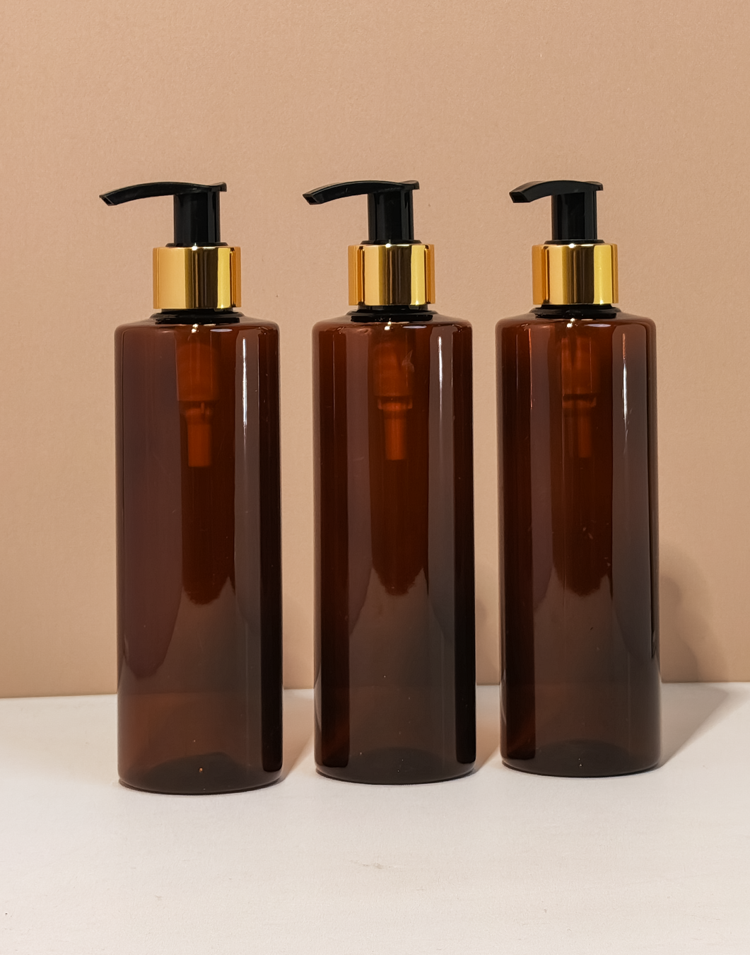 250Ml Tall Pet Bottle With Old Gold Black Lotion Pump