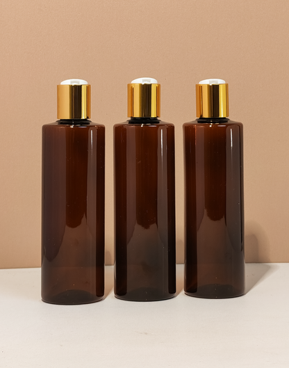250Ml Tall Pet Bottle With Gold Press Cap