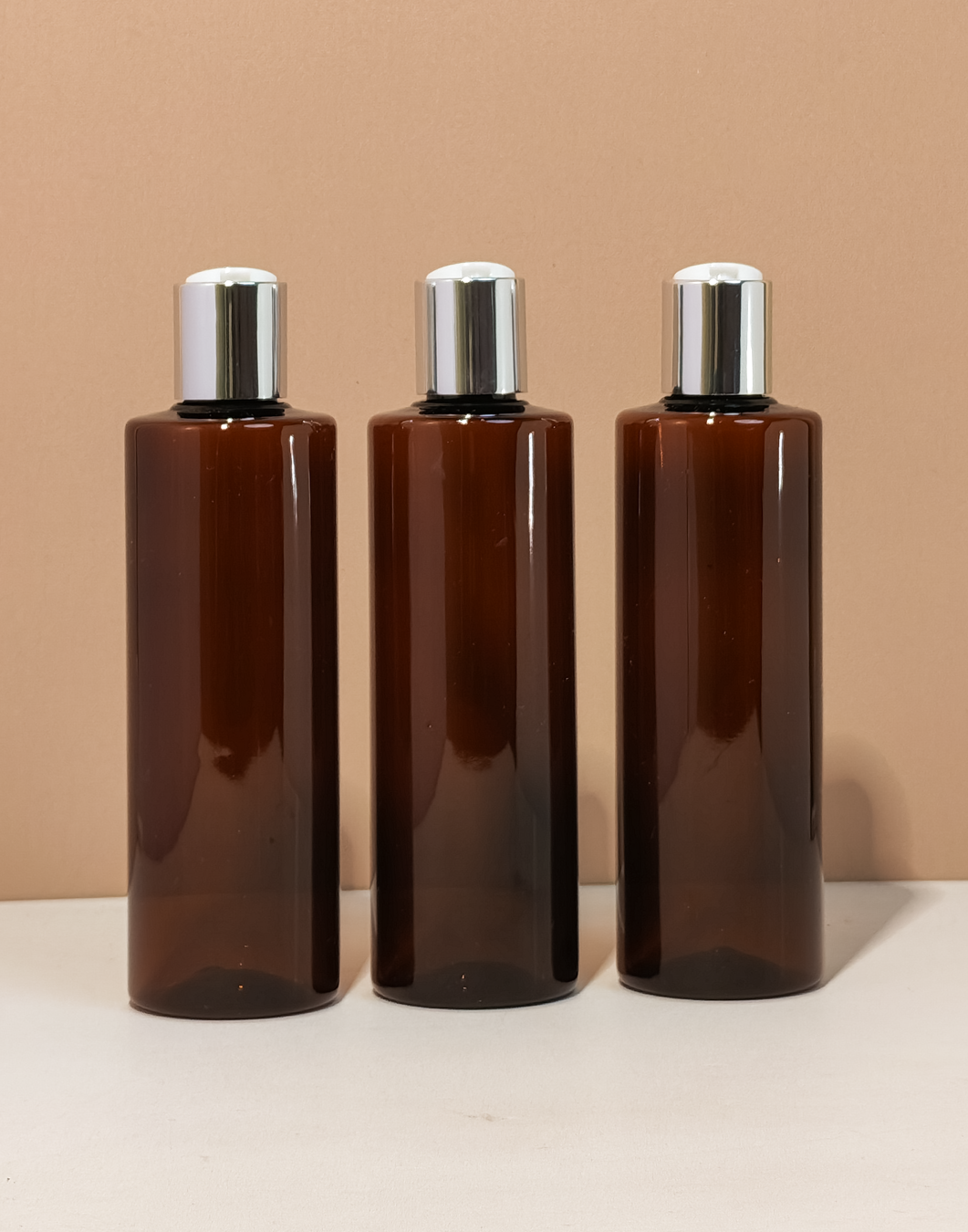 250Ml Tall Pet Bottle With Silver Press Cap