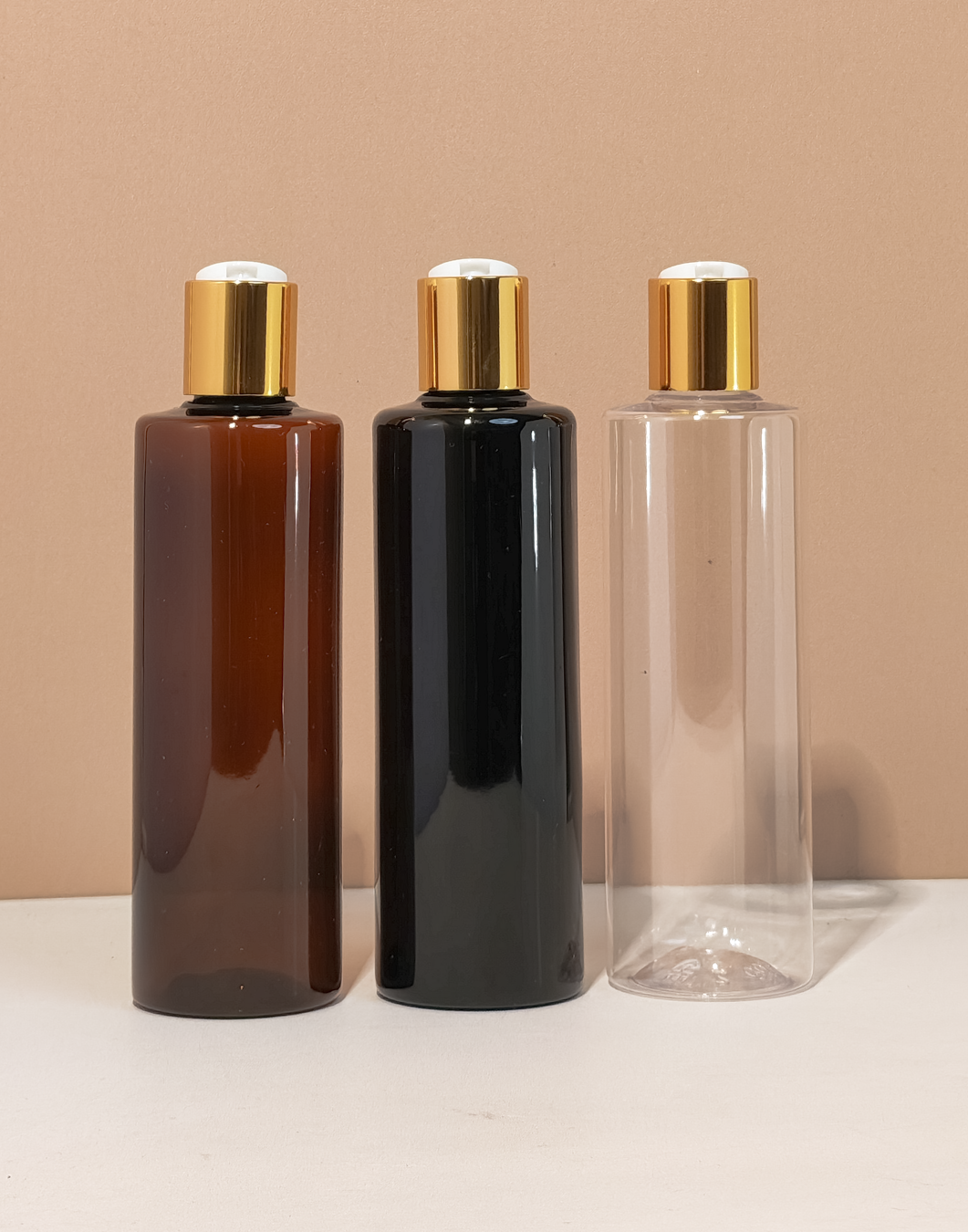 250Ml Tall Pet Bottle With Gold Press Cap