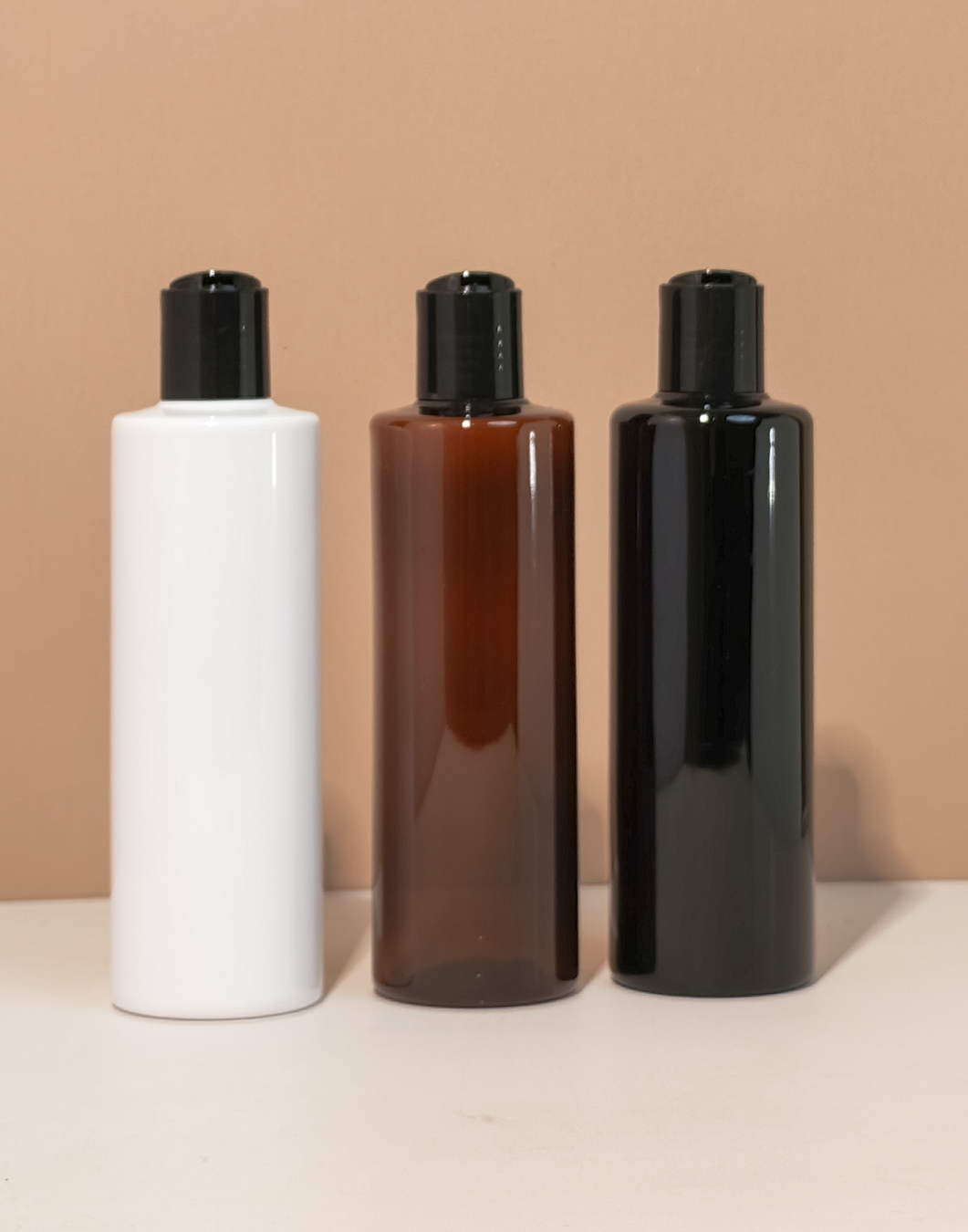 250Ml Tall Pet Bottle With Black Press Cap